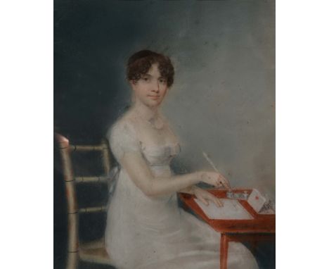 CIRCLE OF ADAM BUCK (1759-1833) Portrait of a young lady seated and writing a letter at a small table, pastels, 22 x 19cm The