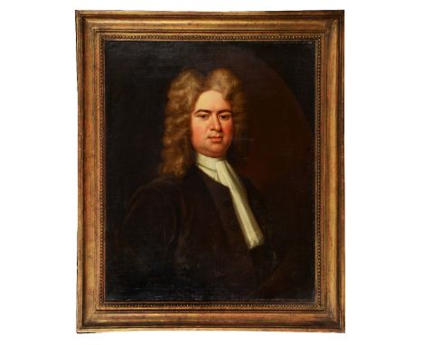 ATTRIBUTED TO JOHN VANDERBANK (1686-c.1739) Portrait of a gentleman with long curly wig and wearing a brown overcoat with whi