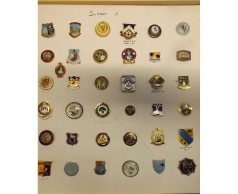 A collection of approximately 200 enamel and acrylic bowling badges on cards and framed including Sussex, Surrey and Monmouth