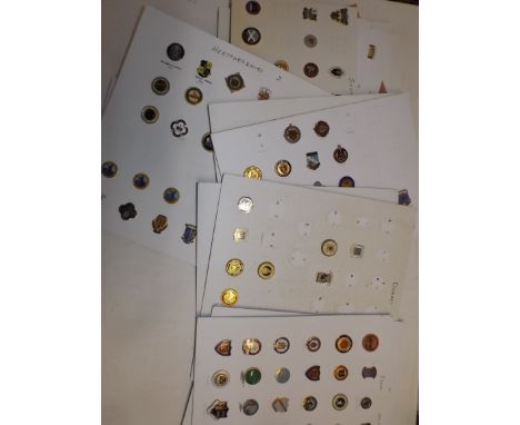 A large quantity of enamel and acrylic bowl badges mounted on card and some loose.