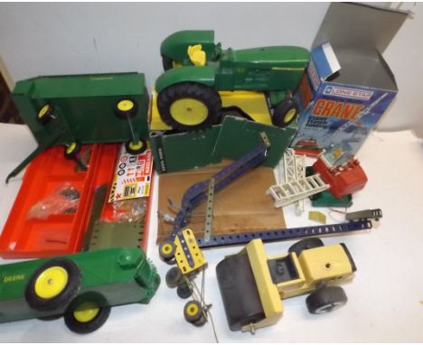 A Die-cast John Deere tractor and two trailers by ERTL, Meccano etc.