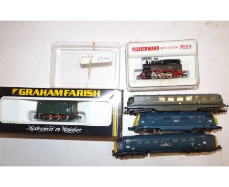 Five 'N' gauge locomotives:- two by Graham Farish, 1x Bachmann, 1x Trix and 1 Fleischmann.