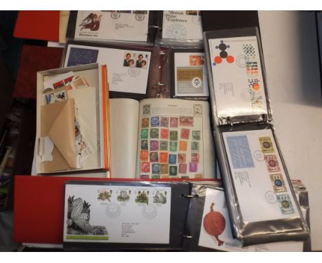 First day covers in four albums, together with other stamps.