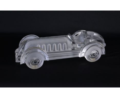 Daum France Crystal Monoplace Le Mans 1:14 Scale Model Car. Signed along side. Dimensions: 4.25 x 14.5 x 6 in.