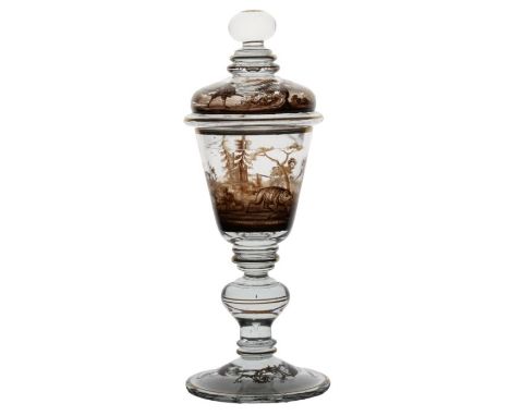 Bohemian Schwarzlot glass goblet and cover, circa 1880, the flared goblet painted with various aspects of a boar hunt, the co