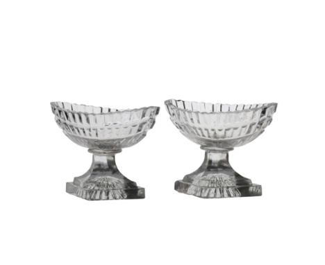 A pair of 19th Century salts, Irish circa 1800, boat shaped with "lemon squeezer" feet, 8cm high, (2)