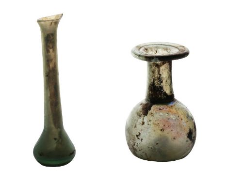 Two pieces of Roman glass, 2nd - 4th Century AD to include a small flask with flared base and pouring lip to one side, 9.5cm 