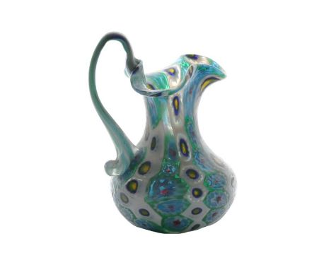 Murano murrine glass jug, circa 1900, by Fratelli Toso, the an arched handle and spout above the bulbous body, 10cm tall