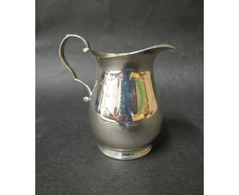 A William Hutton & Sons Ltd silver cream jug on circular base, Birmingham 1931, 119g