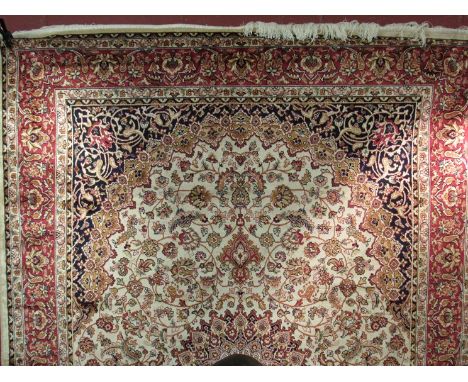 A modern beige ground Keshan carpet. 2.30m x 1.60m