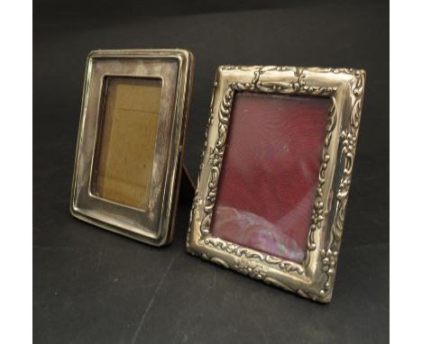 Two silver photograph frames one with embossed detail, Thomas Hayes, Birmingham, 1902 and G F Westwood & Sons 1918 