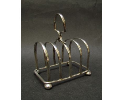 A Robert Chandler silver five bar toast rack, Birmingham 78g