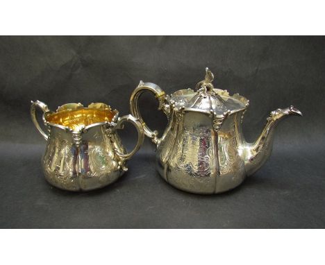 A silver teapot and matching gilded internal sugar bowl, monogrammed, Sheffield 1855/58 by H.Y. Wilkinson, 1144g