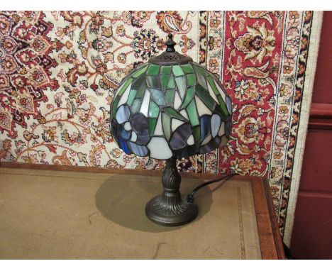 A small Tiffany style lamp 