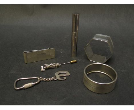 Various silver items including two napkin rings, money clip, "D" keyring, golf bag stick pin, toothpick holder