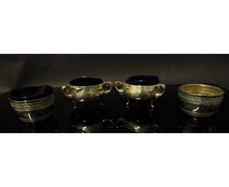 A near pair of Charles Edwards Art Nouveau silver salts, London marks rubbed, liners a/f, and a pair of Victorian silver salt