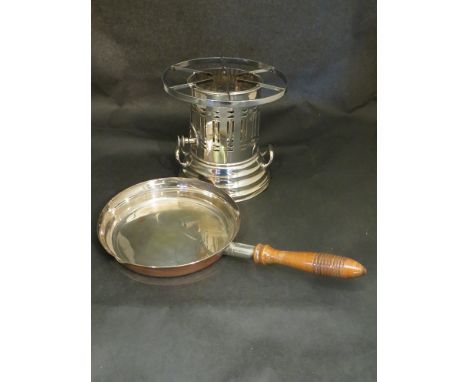 A silver plated burner with copper pan for crepe suzette