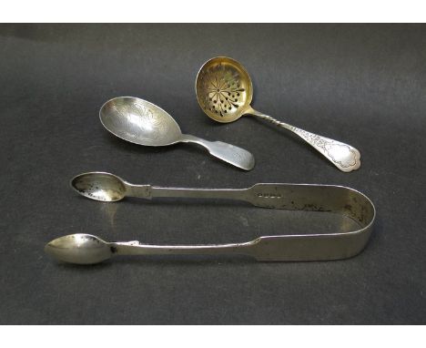 Three Victorian silver items to include, caddy spoon, sugar sifter and sugar tongs, 80g