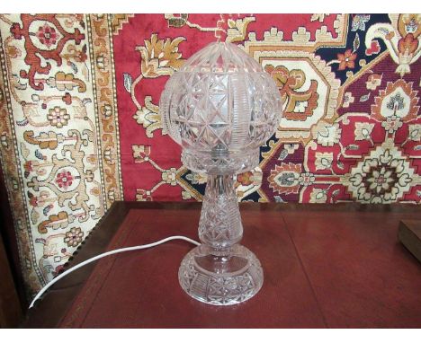 A cut glass electric globe form lamp 