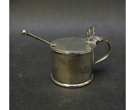 A silver salt with blue glass liner and spoon, Chester marks rubbed, and silver plate wine taster, 54g