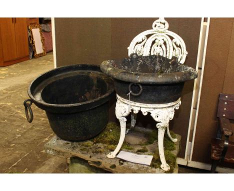 Weathered cast iron wall mounted corner trough 57cm wide, large cast iron cauldron with ring pull handles 60.5cm wide and cas