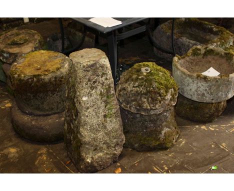 Collection of eleven pieces of weathered stone including circular trough, pillars, bird bath, etc