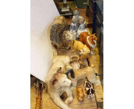 Two Melba Ware lions, Beswick dogs, two Nao figures, etc