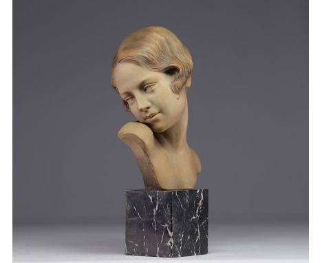 Auguste Henri CARLI (1868-1930) Art Deco terracotta bust of a "Young Woman" mounted on a black veined marble base. - Weight: 