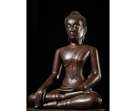 A LARGE COPPER ALLOY FIGURE OF A SEATED BUDDHA, RATTANAKOSIN PERIODThailand, 19th century. Cast as Buddha seated on a tapered