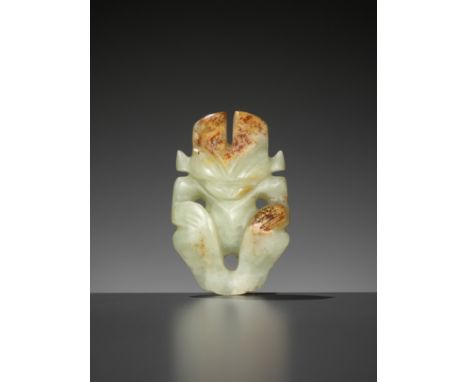 A RARE YELLOW AND RUSSET JADE 'HUMANOID FIGURE' PENDANT, HONGSHAN CULTUREChina, Neolithic period, c. 4000-3000 BC. Worked in 