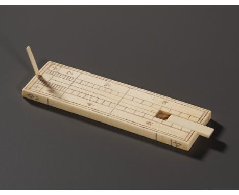 AN IVORY SUNDIAL, TUGUI, QING DYNASTYChina, 1644-1912. Of rectangular form, incised with characters to one side indicating ti