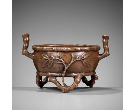 A COPPER ALLOY 'BAMBOO' CENSER, QING DYNASTYChina, 1644-1912. Finely cast in openwork, supported on three curled bamboo branc