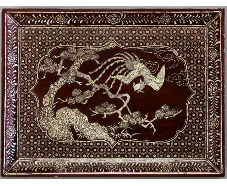 A RARE INLAID LACQUER 'PHOENIX' TRAY, MING DYNASTYChina, 15th-16th century. Of rectangular shape, lacquered in an elegant red