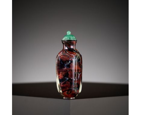 Bonhams : A turquoise porcelain carved 'landscape' snuff bottle