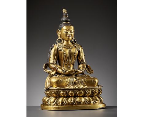 A CAST AND REPOUSSE GILT COPPER ALLOY FIGURE OF AMITAYUS, QIANLONG PERIODChina, 1736-1795. The figure is shown seated in dhya