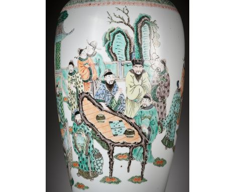 A FAMILLE VERTE 'CHESS PLAYERS' BALUSTER VASE, QING DYNASTYChina, 19th century. The ovoid vase tapering towards the base, sur