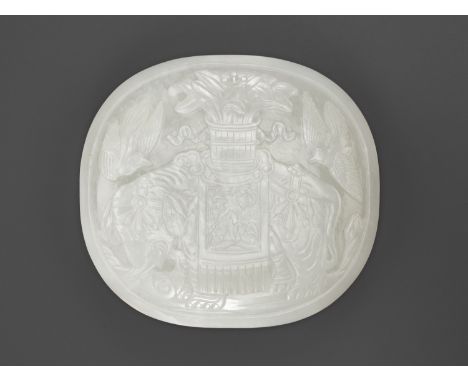 A WHITE JADE 'ELEPHANT' PLAQUE, 18TH-19TH CENTURYChina. Of oval, domed form, carved at the center with a caparisoned elephant