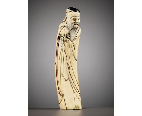 AN IVORY FIGURE OF SHOULAO, MING DYNASTYChina, 16th-17th century. The standing immortal carved from the curved tusk holding a