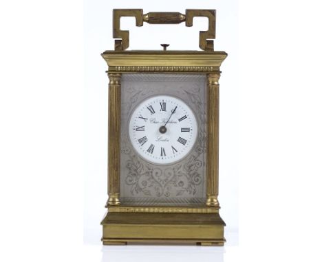 A French brass-cased carriage clock, by Charles Frodsham of London, with fluted columns and striking movement, case height 16