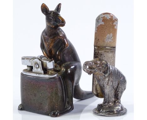 A novelty kangaroo design table lighter, height 9cm, and an electroplate elephant design table lighter (2) 