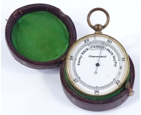 A 19th century pocket barometer, enamel dial in gilt-metal case, with original red leather travelling case, diameter 4.5cm 