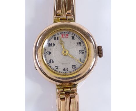 A lady's Vintage 9ct gold wristwatch, 15 jewel mechanical movement, on 9ct expanding strap, case no. 63834, case width 24mm, 