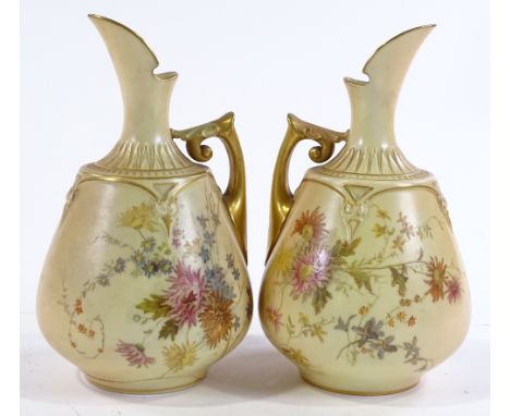 A pair of Royal Worcester ewers with painted floral and gilded decoration, pattern no. 1668, registered no. 211928, height 17