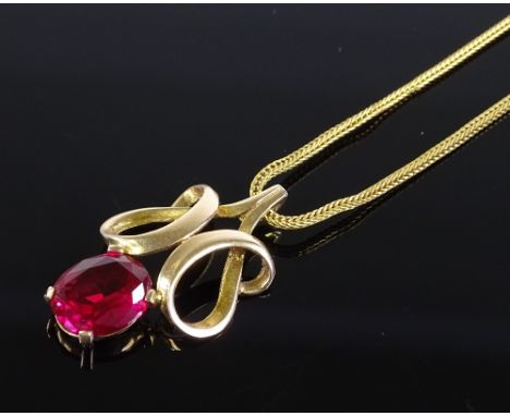 A 9ct gold ruby pendant necklace on 9ct chain, pendant height 29.8mm, chain length 460mm, 6.4g 