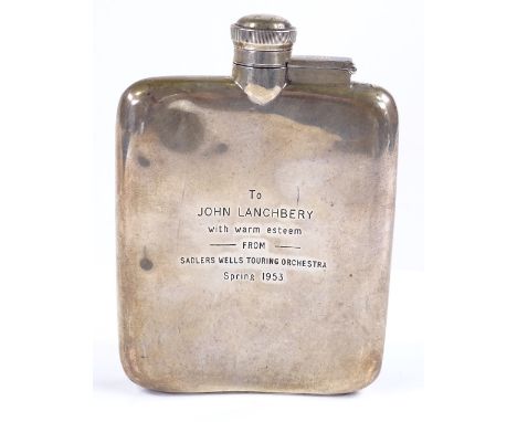 A curved silver hip flask, with inscription to John Lanchbery from the Sadlers Wells Touring Orchestra in 1953, Lanchbery was