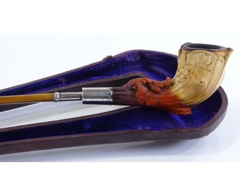 A 19th century silver-mounted carved Meerschaum pipe, length 43cm, in original leather case 