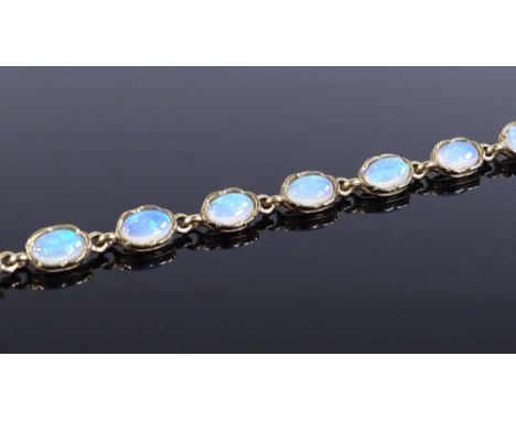 A 9ct gold opal panel bracelet, length 180mm, 5g 