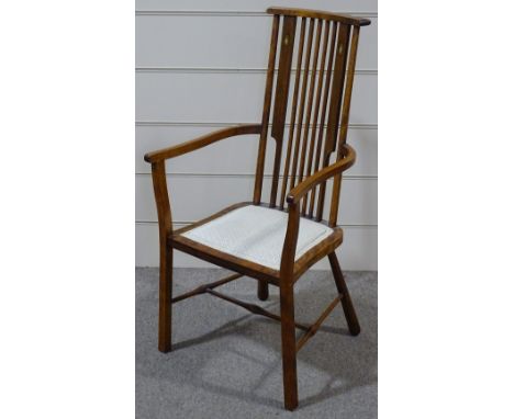 An Art Nouveau beech-framed comb-back chair, with marquetry inlaid splat 