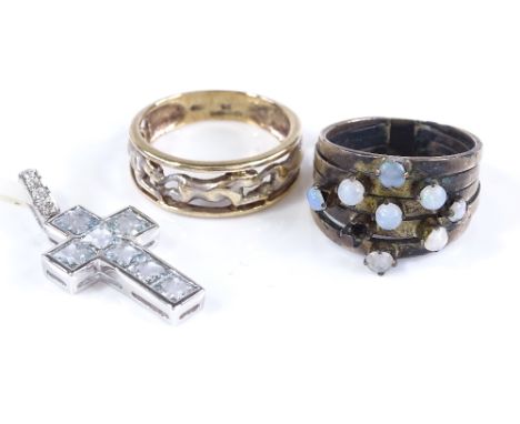 A 9ct white gold aquamarine and diamond cross pendant, together with an unmarked gold 5-section opal ring, and a 9ct cheetah 