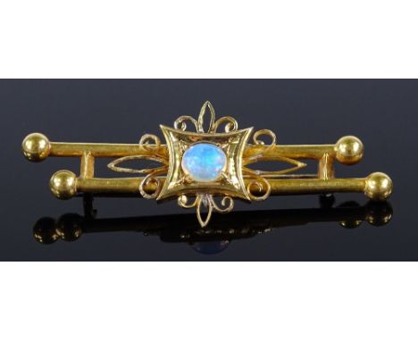 An Edwardian unmarked gold cabochon opal brooch, settings probably 18ct gold, length 51.6mm, 7.5g 